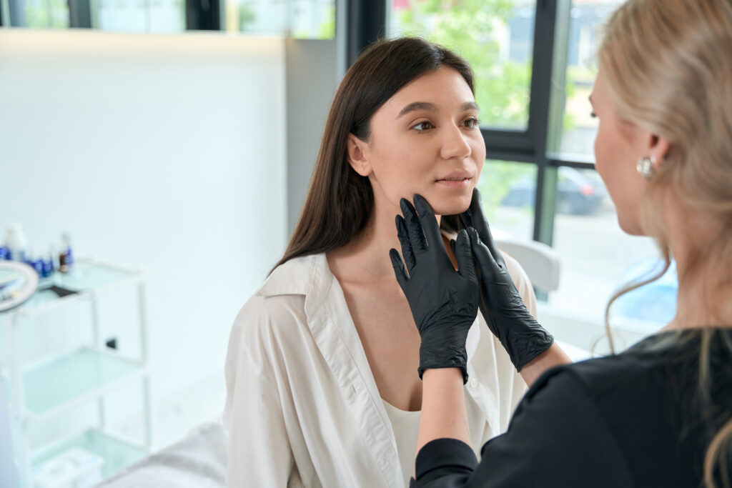 Best Skin Treatment for Pigmentation: Options Compared - 4 - Esteem Clinic dermatologist examining woman face before treatmen 2026 03 10 02 02 18 utc Best Skin Treatment for Pigmentation: Options Compared - 3